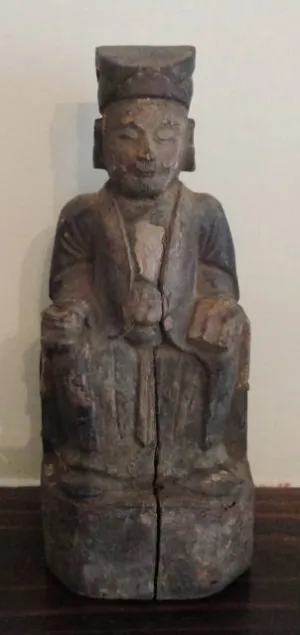 A Chinese Wooden Devotional Figure.