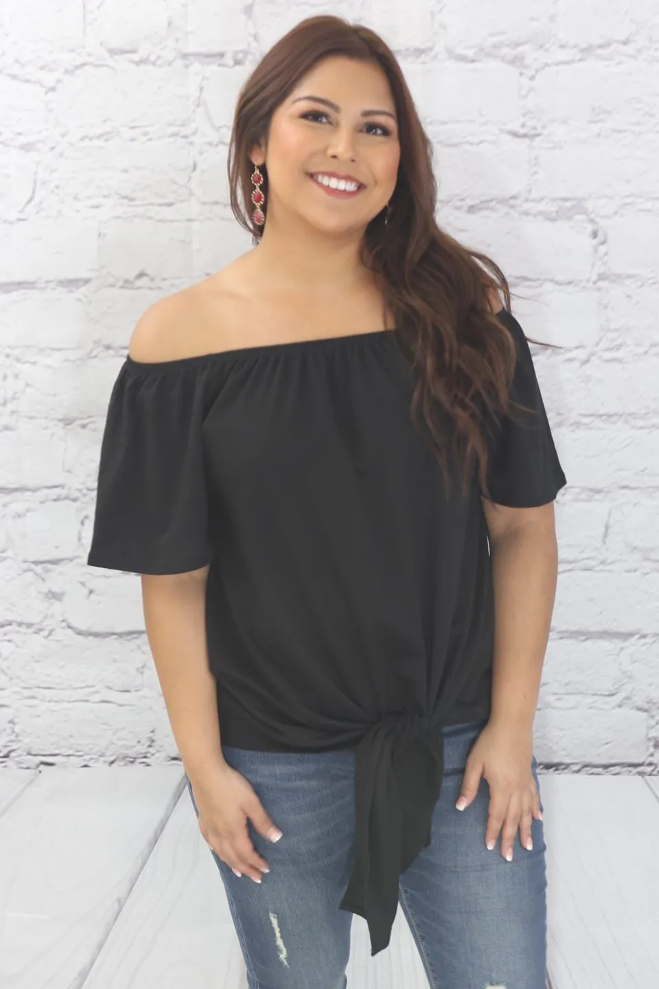 Off the shoulder solid knit top with self tie knot