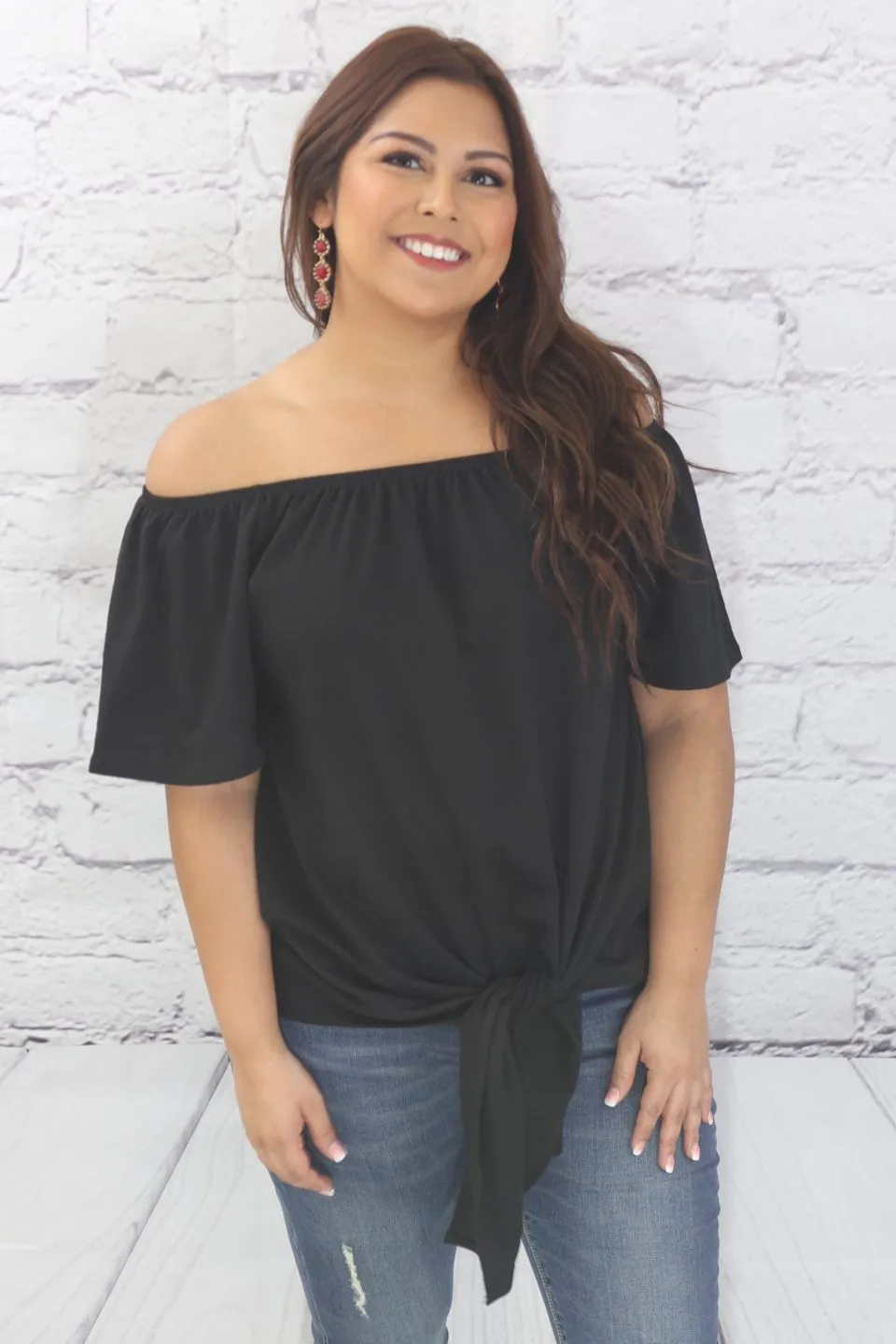 Off the shoulder solid knit top with self tie knot